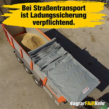 Ein Lkw mit einer gedeckten Ladung Getreide; laut Text ist die Ladungssicherung beim Straßentransport vorgeschrieben.